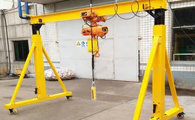 Precio, Especificaciones y Conficuraciones de Grúa Pórtico Móvil de 2 Toneladas 5m y H-6m con Polipasto Eléctrico de Cadena Venta a Colombia